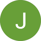 A graphic icon featuring a white capital letter J centered inside a solid green circle.